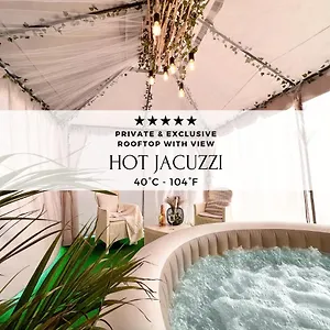 colosseo-attico-con-jacuzzi-nel-cuore-di-roma.it-romehotels.com/